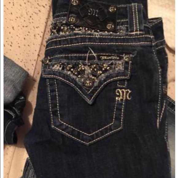 I'm selling a pair of Miss Me Jeans