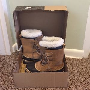 Size 7 Sorel boots. NEVER WORN! Originally $150