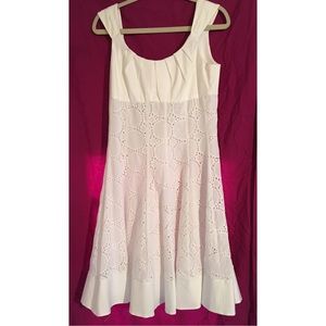 White dress with ilet design