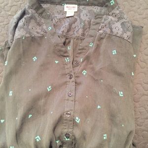 Charcoal gray flowy top with turquoise details!