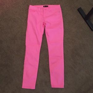 Bright pink skinny jeans