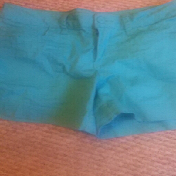 Teal/green blue.  Fadedglory shorts.
