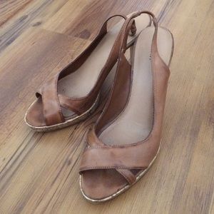 Tan peep toe sandals with cork heel