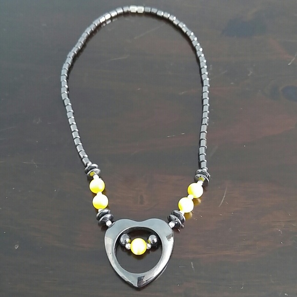 Yellow and black heart necklace