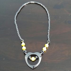 Yellow and black heart necklace