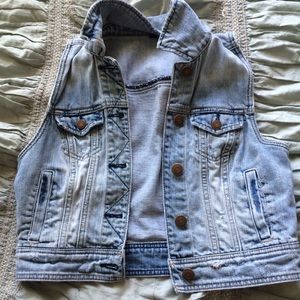 distressed jean vest