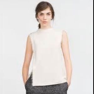 Zara blouse with zipper and side frayed detail