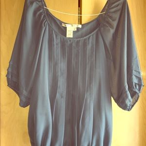 Soft blue blouse with billowy sleeves