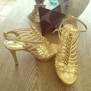 BCBG Gold strap high heel shoes size 7
