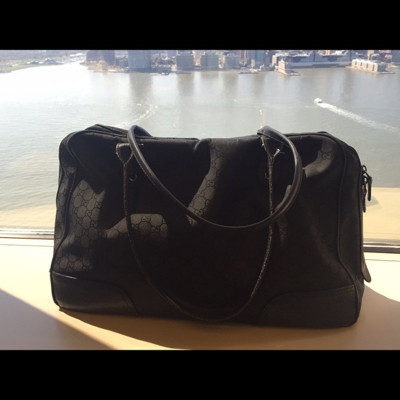 Authentic Fabric with leather trim Gucci Bag.