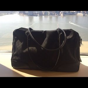 Authentic Fabric with leather trim Gucci Bag.