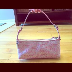 Small light pink coach purse