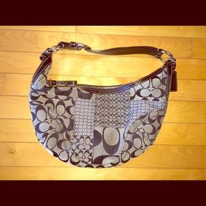 Black and white Coach purse