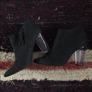 Snakeskin imprinted clear heeled booties