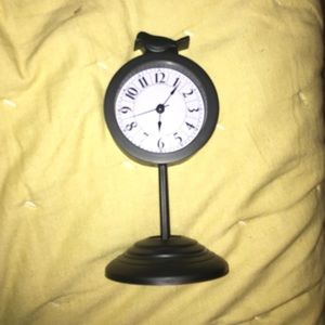 Clock with a crow on top