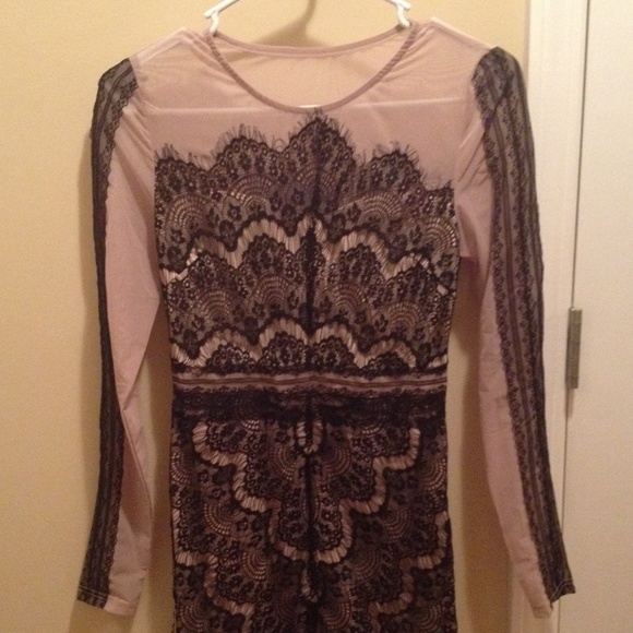 Lace dress with sheer flesh colored underlay