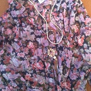 Sheer floral top with rolled sleeves