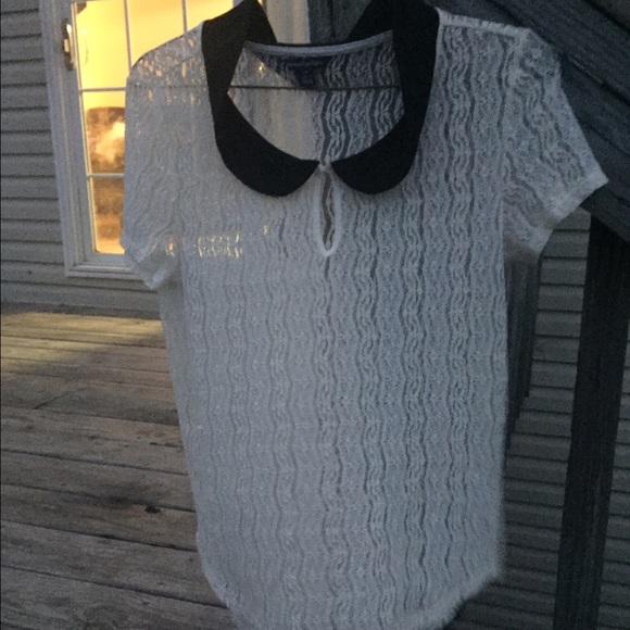 White see through shirts with black color.