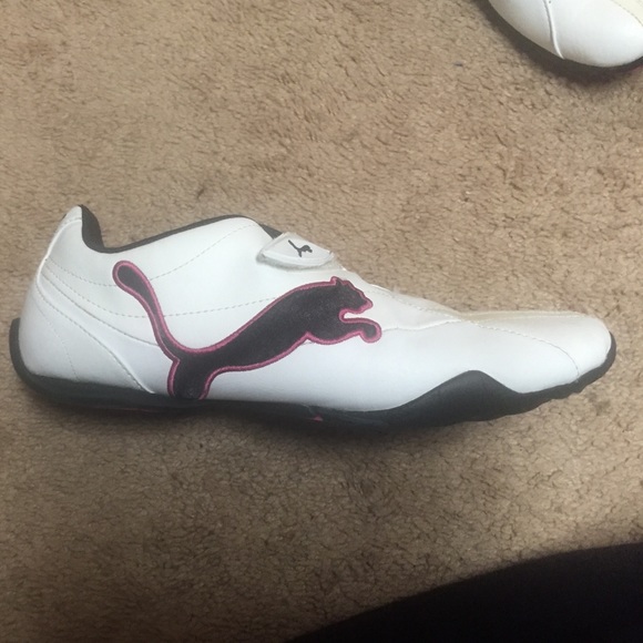pink white and black pumas