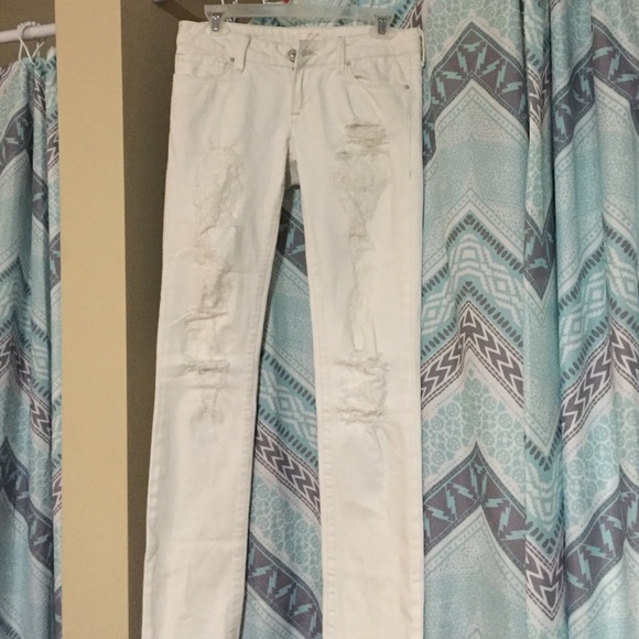 Destroyed white skinny jeans
