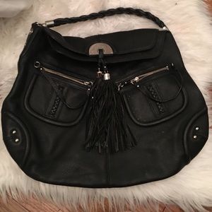 Bebe genuine black leather hobo bag with tassels