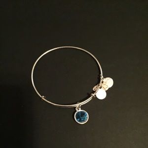 Alexi & Ani silver bracket with Blue stone