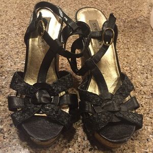 Black Steve Madden wedges.