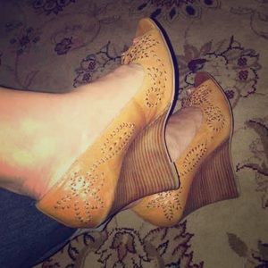 ON HOLD Bakers tan with brown metal accents