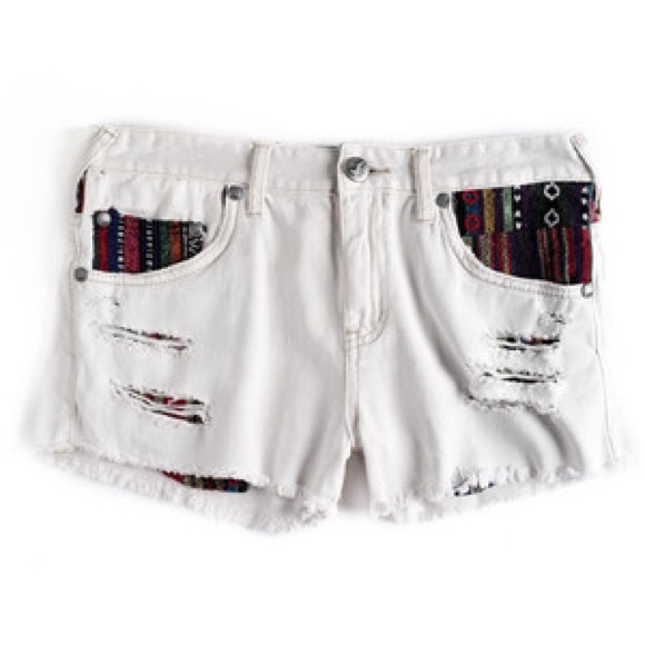 Free People denim shorts with woven pockets