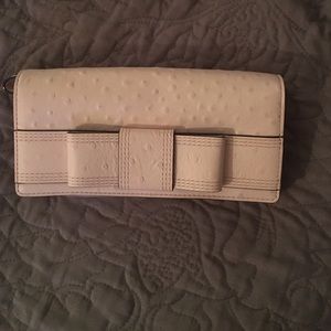Kate Spade bow wallet (NEVER USED)