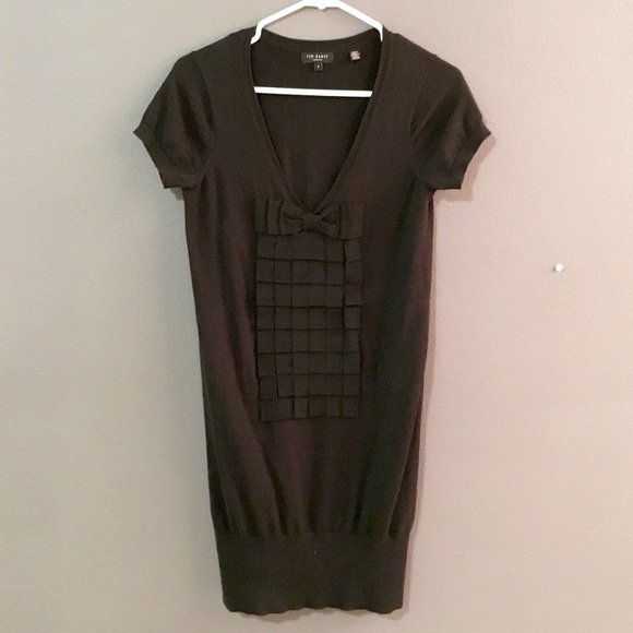 Black sweater dress/top.