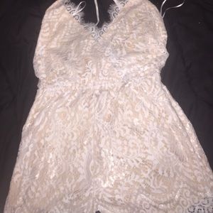 Lace Romper open back white and tan.