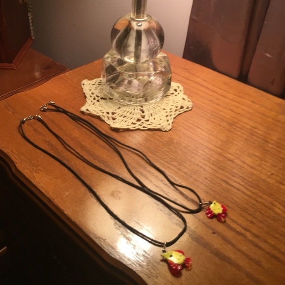 Glass fish necklaces. Hand made, and new.