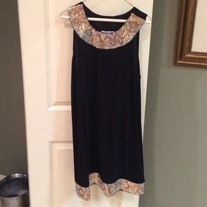 Casual cocktail black dress with sequin trim