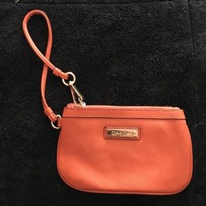 Calvin Klein wristlet orange