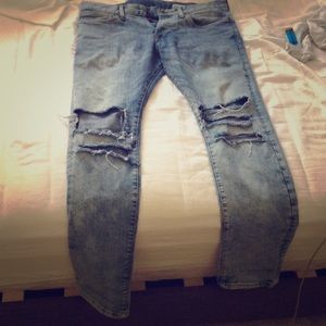 Stone wash light denim blue jeans