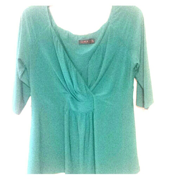 Beautiful emerald green wrap top with 3/4 sleeves