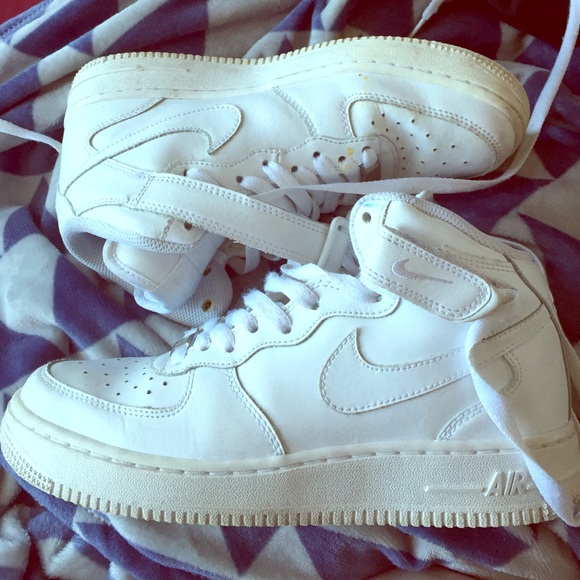 White hi-top Nike Air Force Ones size 5.5 youth.
