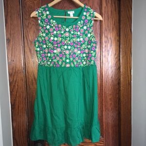 Mini green dress with flower detailing