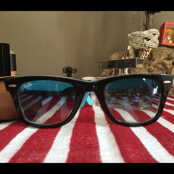 Ray-Ban sunglasses.