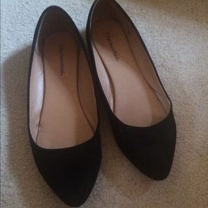 Black pointy flats