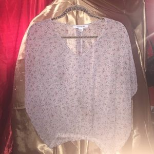 Sheer floral cropped tunic.