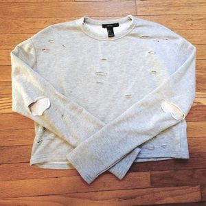 Distressed crop sweater