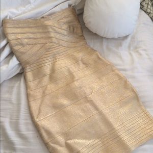 Gold Herve leger inspired dress.