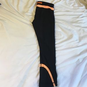 Orange and black Lulu Lemon leggings