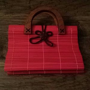 Red bamboo handbag
