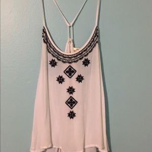 White embroidered top.