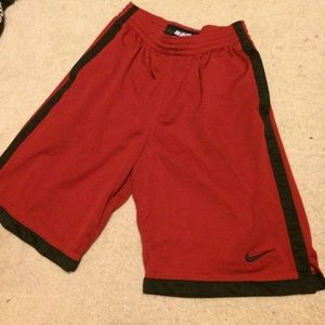 Nike men's basketball shorts red with black stripe