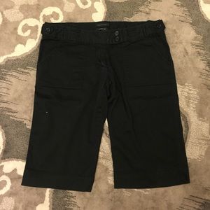The limited knee length black dress pants