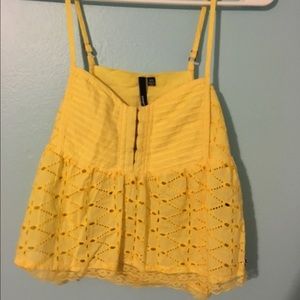 Yellow detailed top.